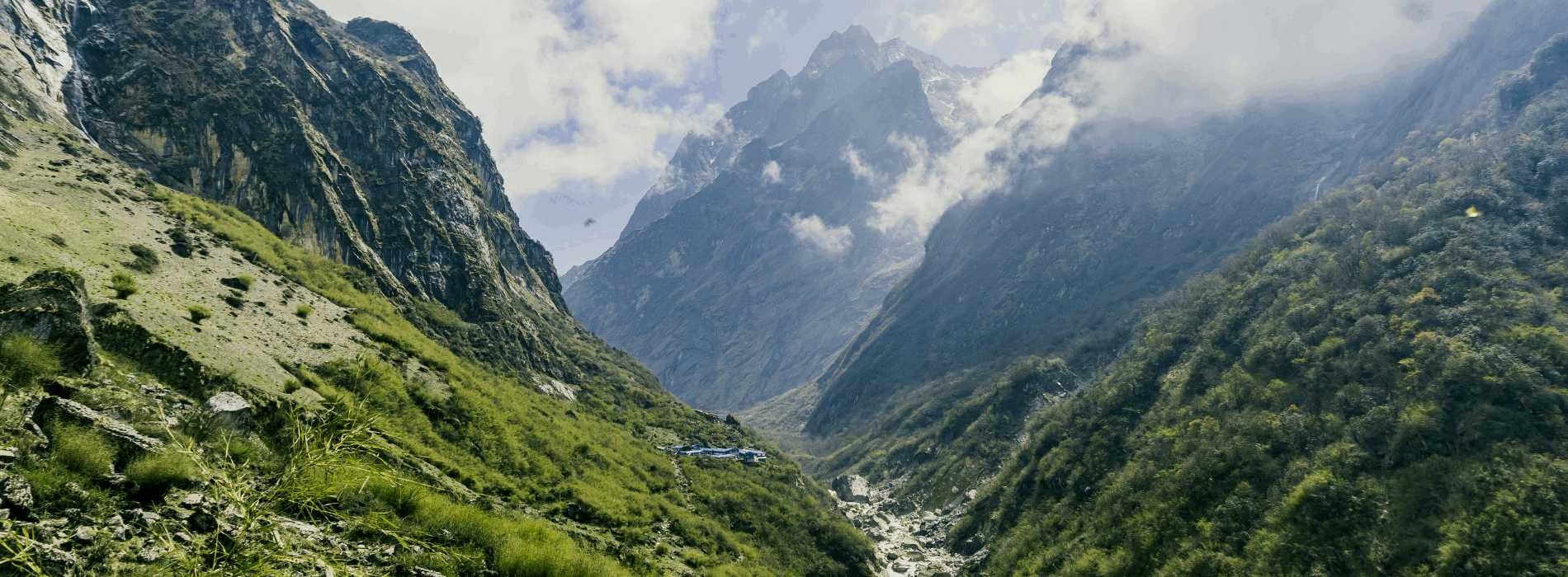 An overhead shot of a remote and lush section of the Annapurna Circuit via Nar and Kang La, Nepal on a cloudy day