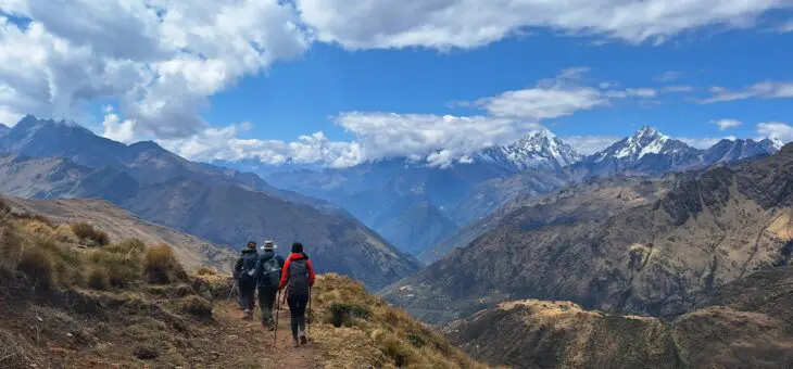 Trekkers hiking through the Peruvian Andes