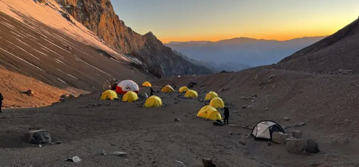 Tents on Aconcagua Camp 1 at sunrise where an expedition doctor is a vital part of the Earth's Edge expedition