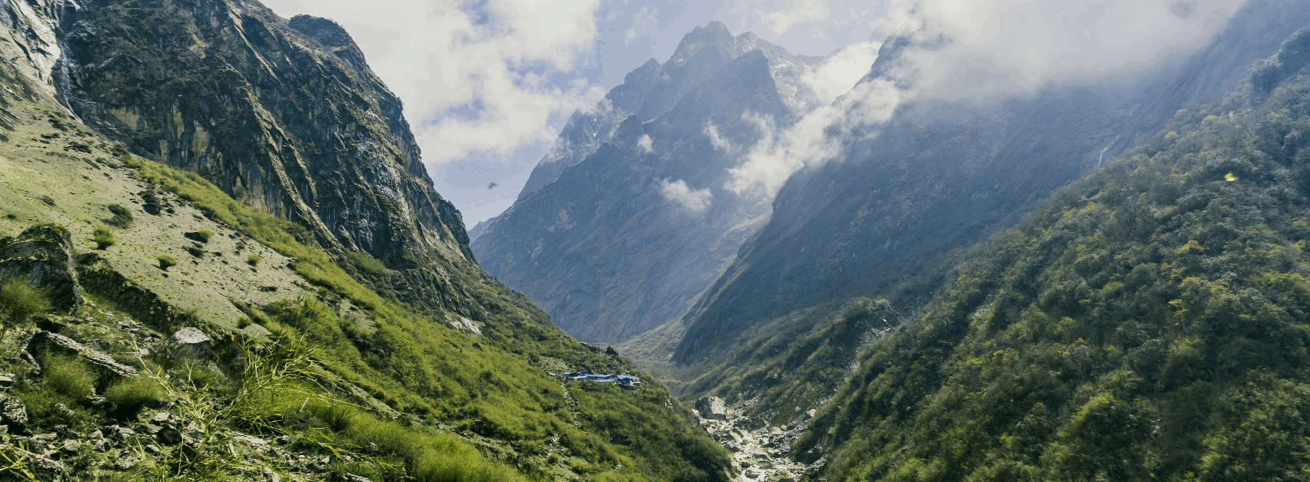 An overhead shot of a remote and lush section of the Annapurna Circuit via Nar and Kang La, Nepal on a cloudy day