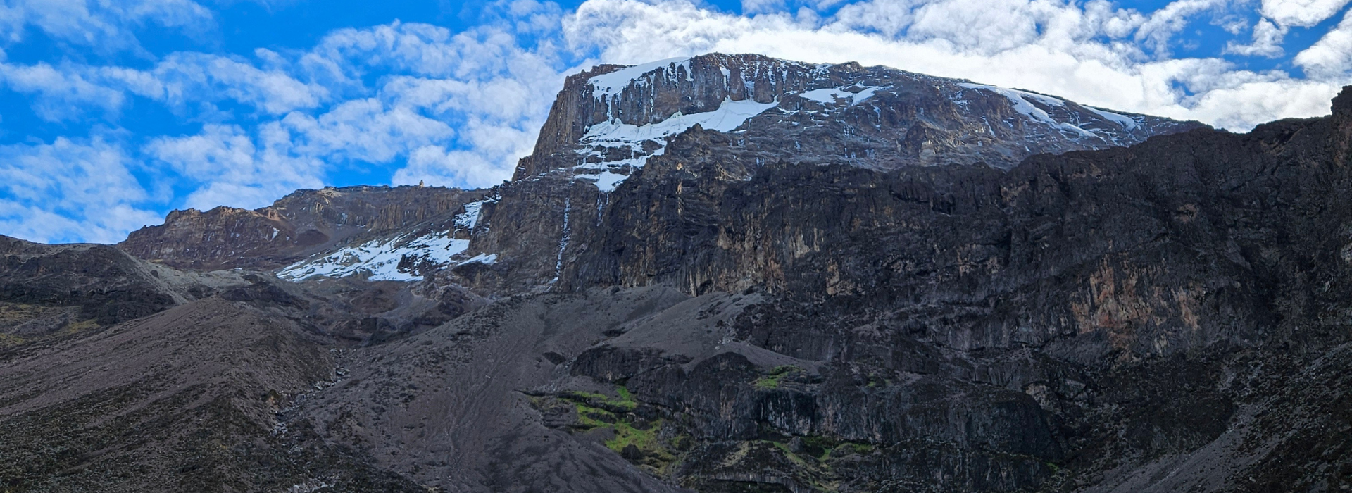 Kilimanjaro's summit against blue sky