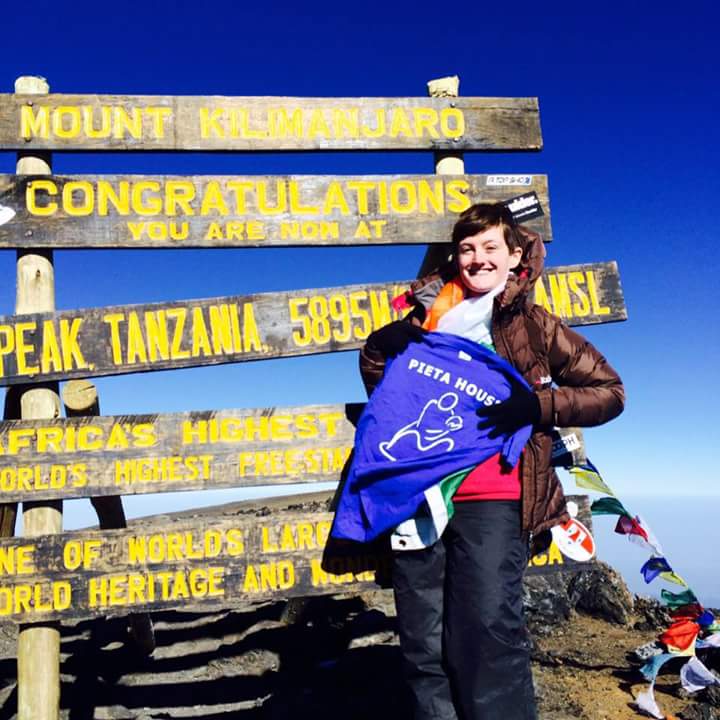 Ellen Ryan at the summit of Kilimanjaro with Earth's Edge