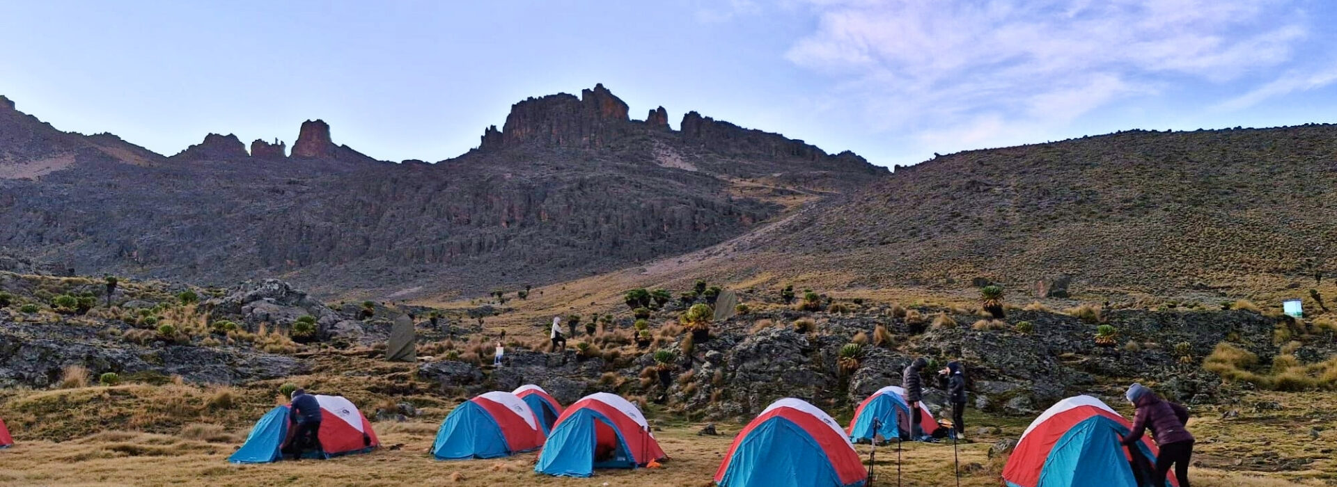 Mount Kenya's jagged peaks over camp on the Kenya Tri-Adventure