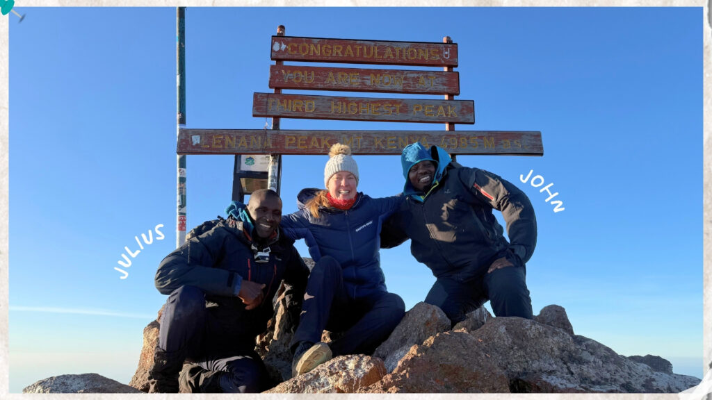 Joannda at the summit of Mount Kenya with guides Julius and John