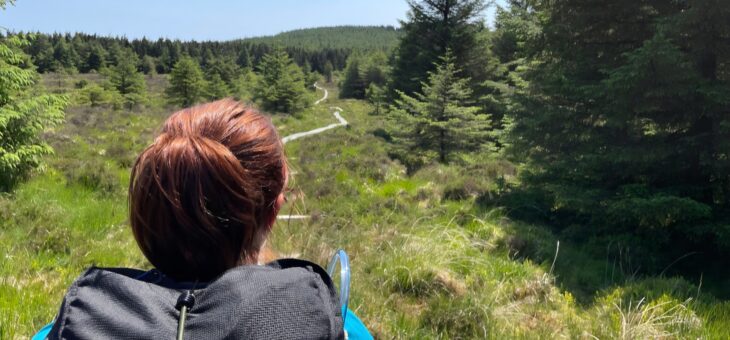 Ciara from Earth's Edge trekking in the hills