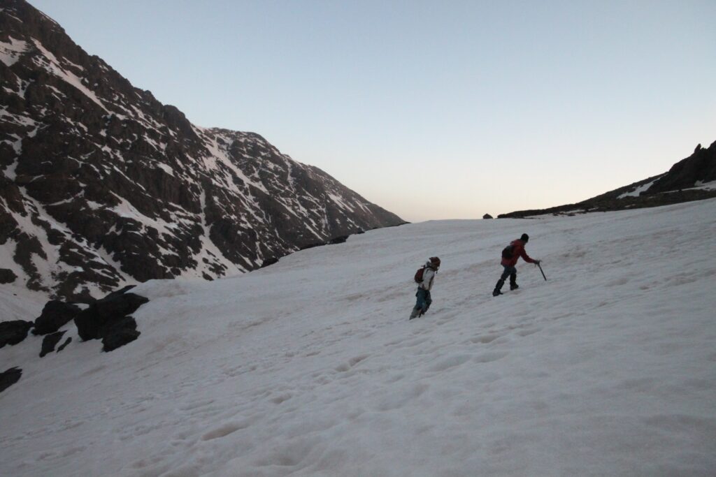 Trekkers climbing through snow to reach the summit of Mount Toubkal (Jebel Toubkal), Morocco