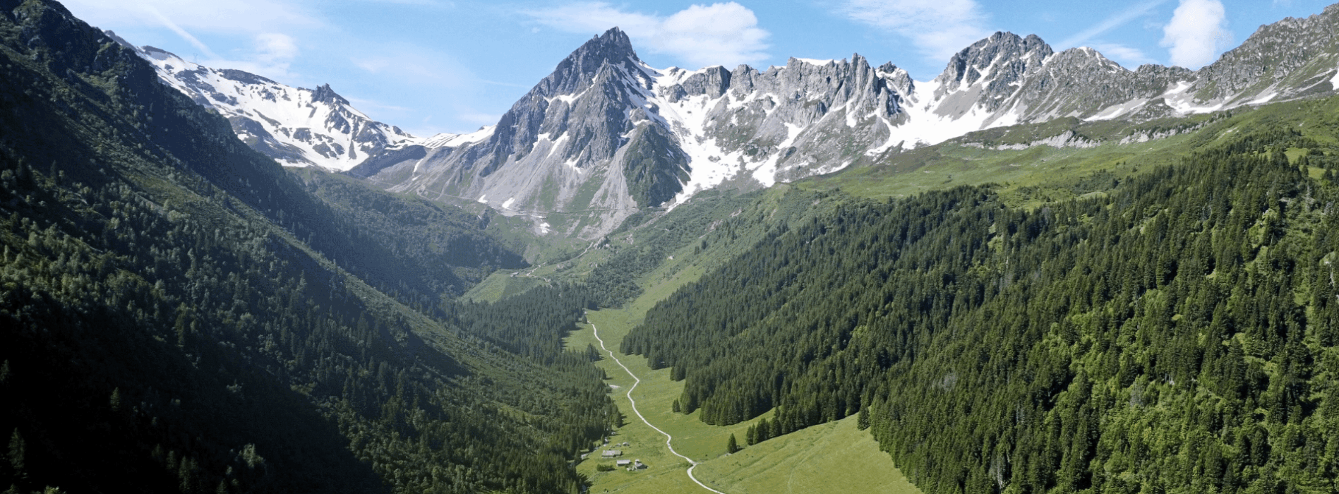 Val Veny on the Italian side of Mont Blanc, a broad alpine valley crossed on the Tour du Mont Blanc route.